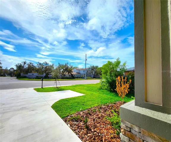 a view of a park and entertaining space