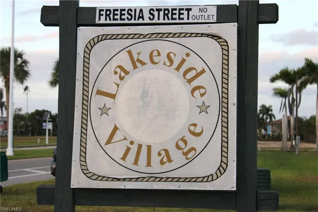 a view of a park with palm trees