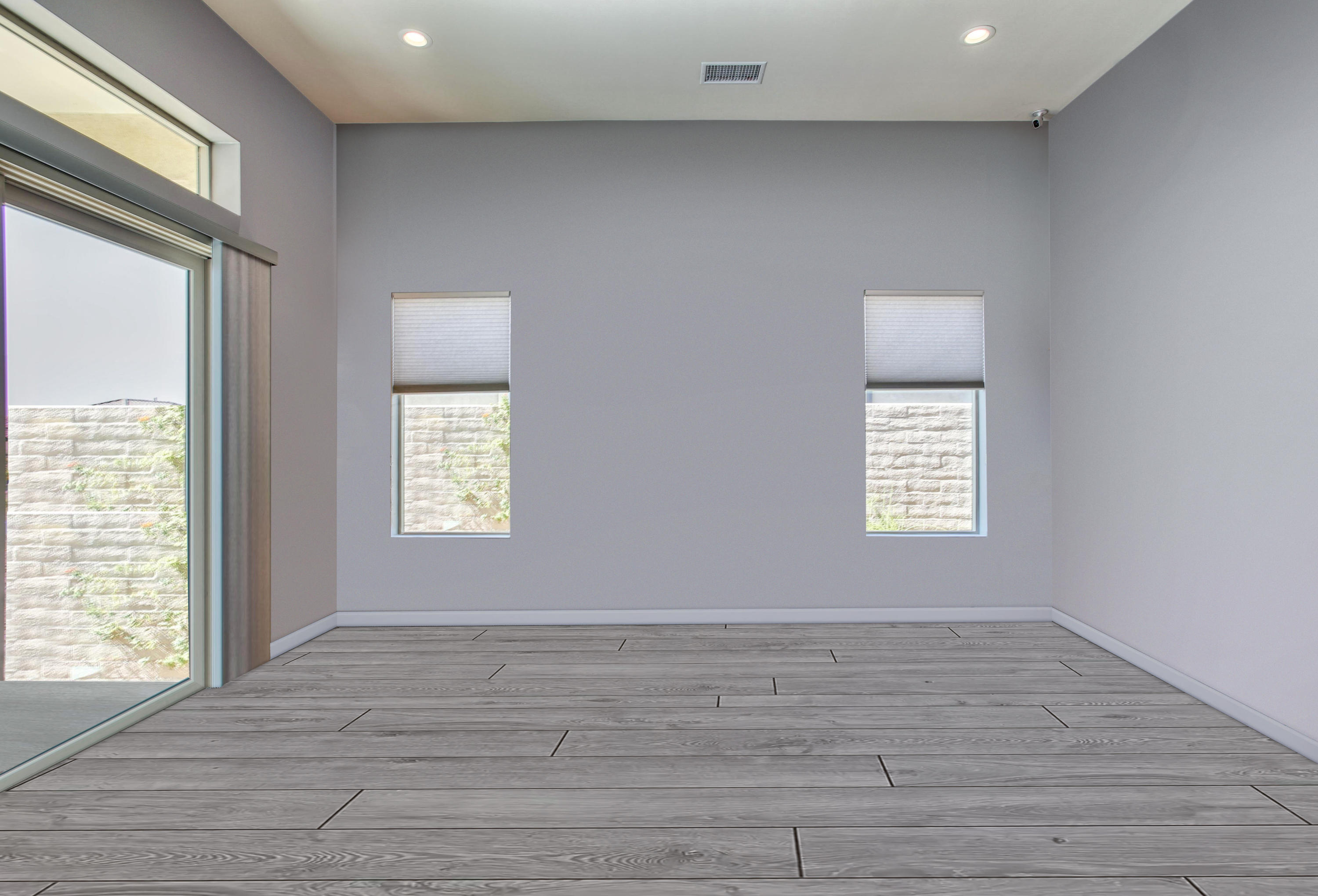 21 Riesling Rancho Mirage, CA 92270 - Photo 11 of 53 a view of an empty room with wooden floor and a window