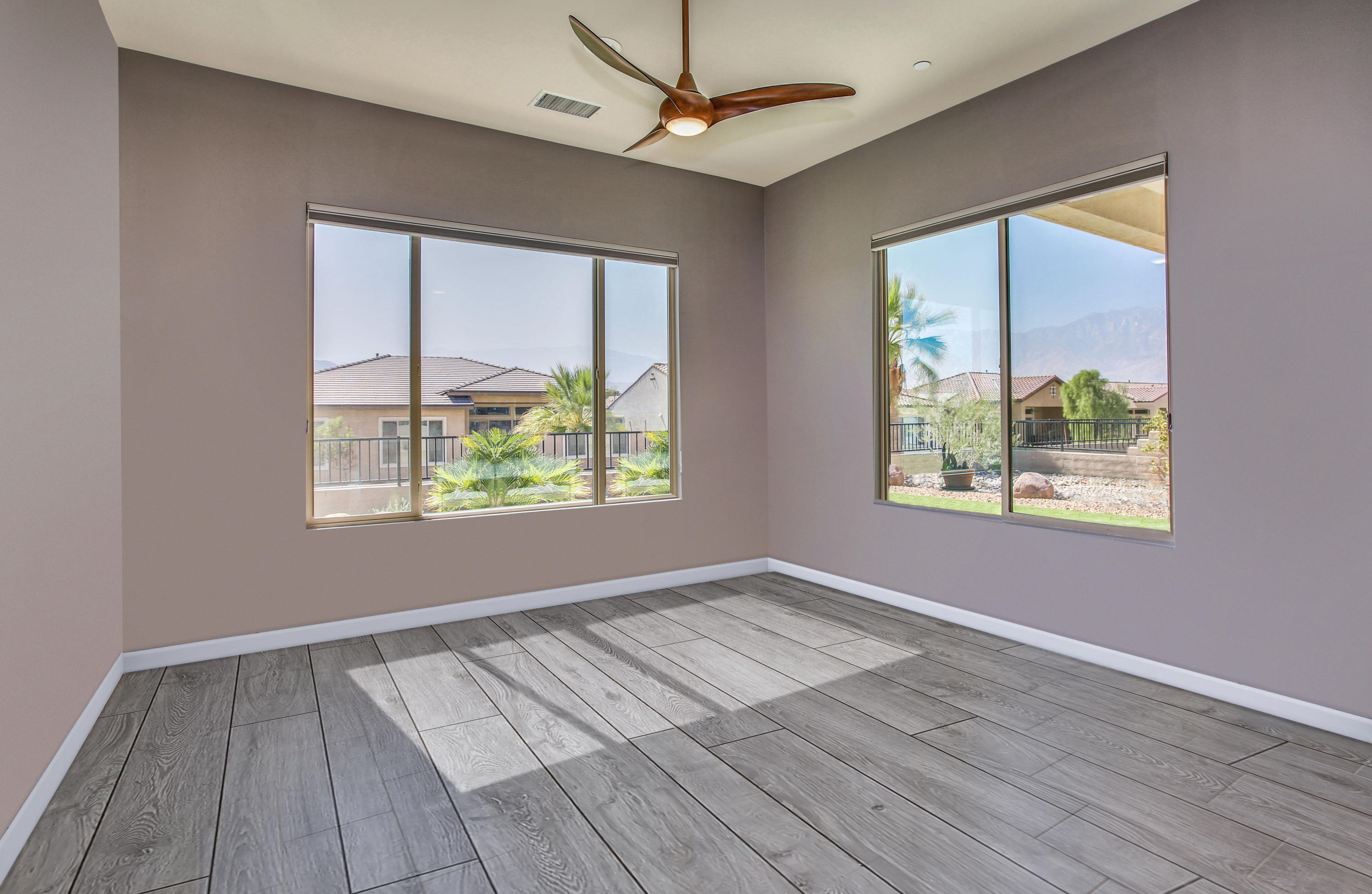 21 Riesling Rancho Mirage, CA 92270 - Photo 19 of 53 wooden floor in an empty room with a window