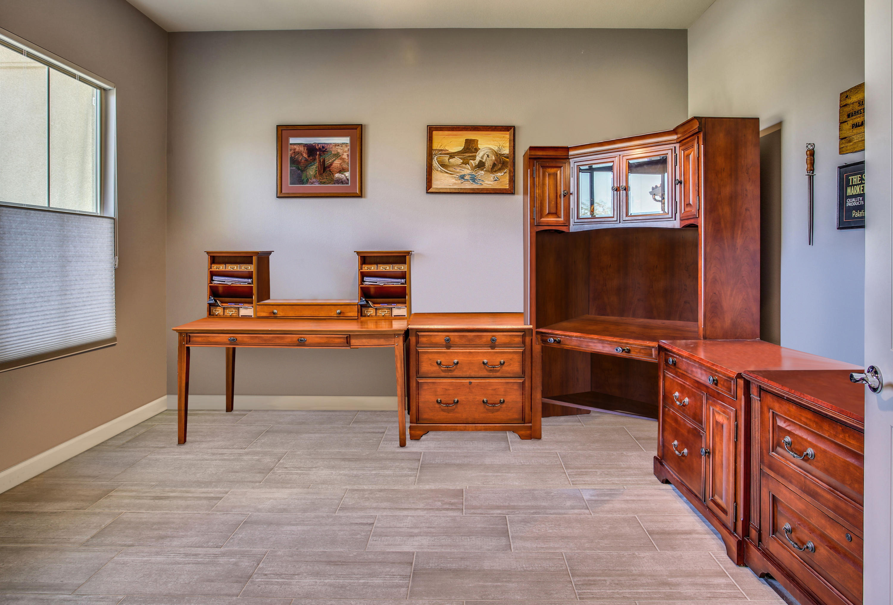 21 Riesling Rancho Mirage, CA 92270 - Photo 21 of 53 a room with furniture and paintings on the wall