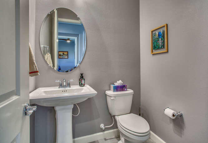 21 Riesling Rancho Mirage, CA 92270 - Photo 29 of 53 a bathroom with a toilet sink and mirror