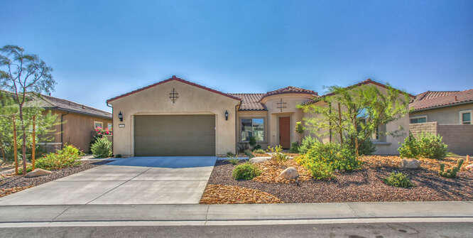 21 Riesling Rancho Mirage, CA 92270 - Photo 30 of 53 a front view of a house with garden