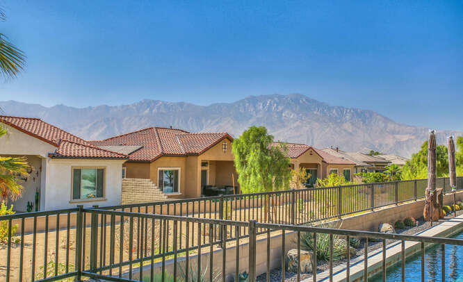 21 Riesling Rancho Mirage, CA 92270 - Photo 33 of 53 a view of a brick house with a small yard