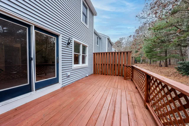 a view of wooden balcony with wooden floor and fence