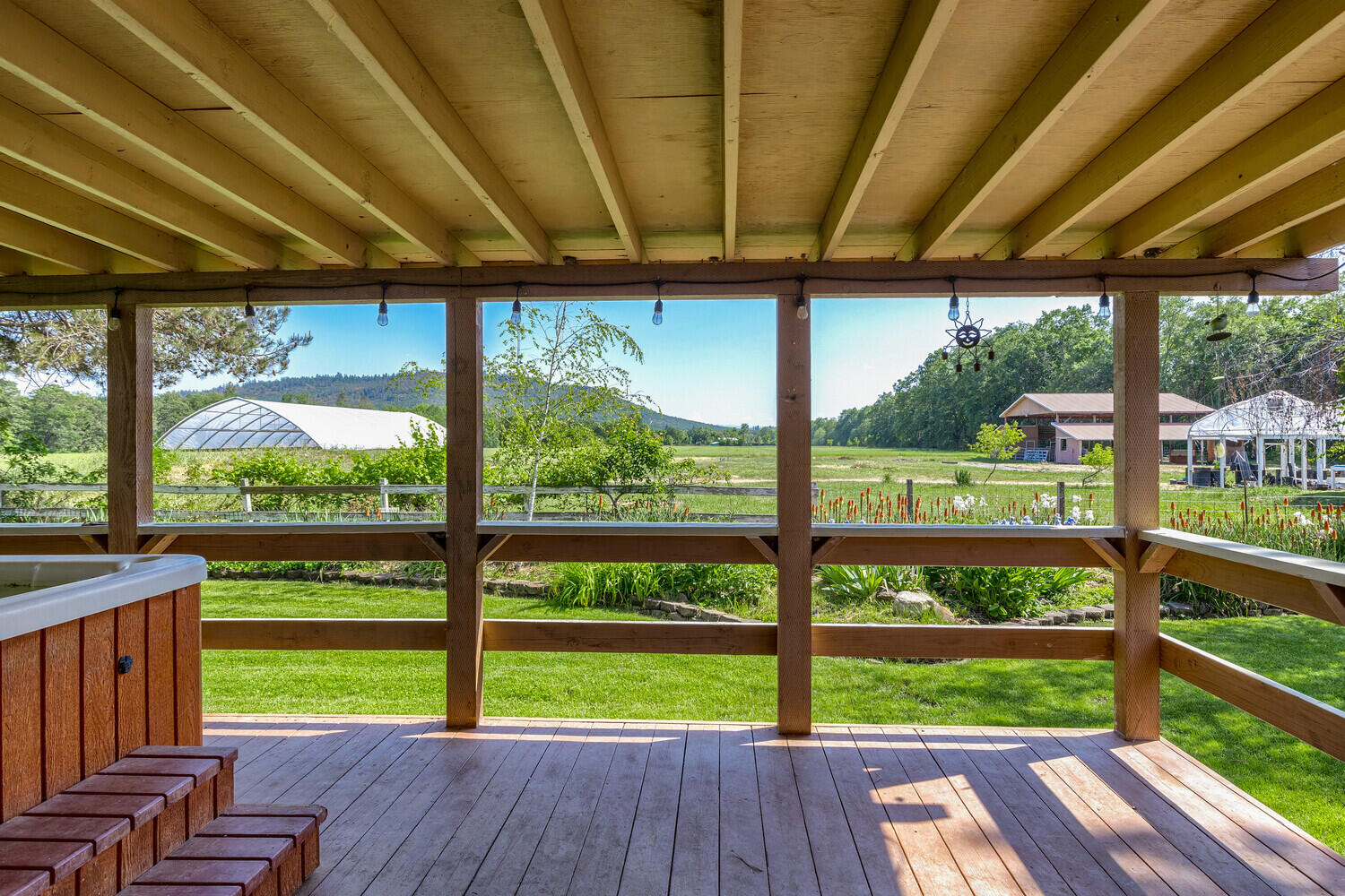10710 Meadows Road White City, OR 97503 - Photo 8 of 46 a view of a porch with furniture and garden