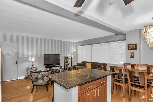 a kitchen with a counter top space and a sink