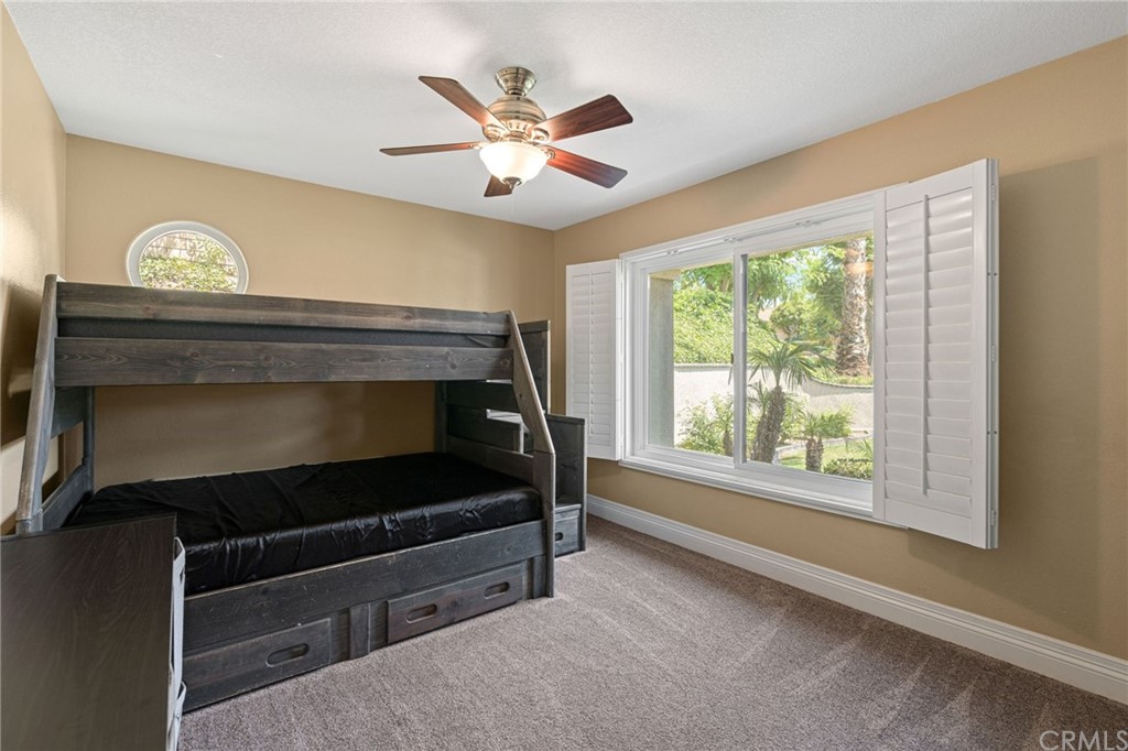 1879 Apostle Lane Riverside, CA 92506 - Photo 28 of 49 a living room with furniture and a window