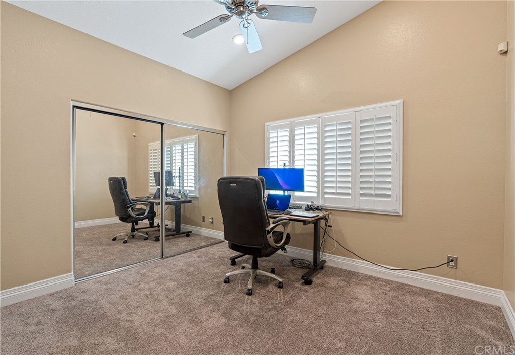 1879 Apostle Lane Riverside, CA 92506 - Photo 31 of 49 a view of a workspace with furniture and a window