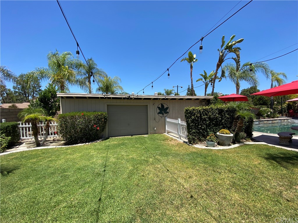 1879 Apostle Lane Riverside, CA 92506 - Photo 34 of 49 a view of swimming pool with outdoor seating and yard