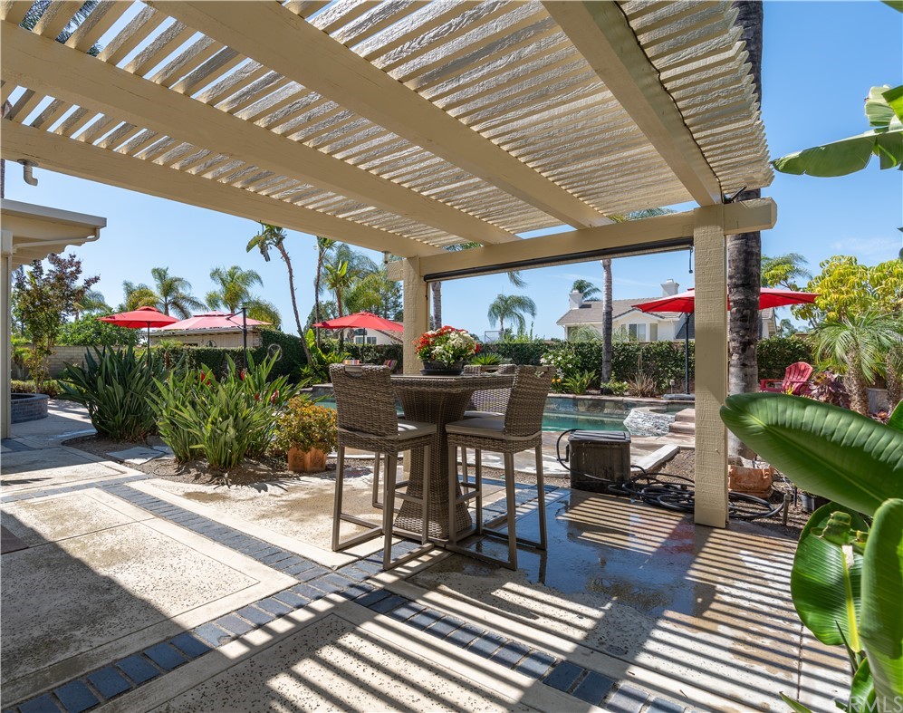 1879 Apostle Lane Riverside, CA 92506 - Photo 36 of 49 a outdoor living space with furniture and a potted plant