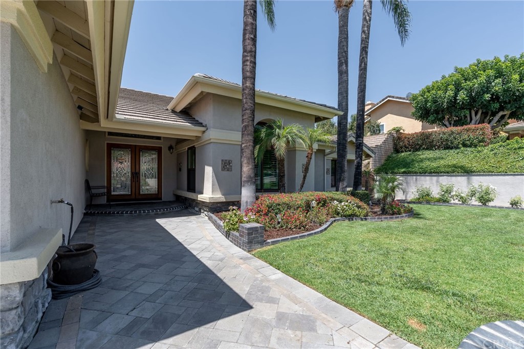 1879 Apostle Lane Riverside, CA 92506 - Photo 4 of 49 a view of an house with backyard porch and entertaining space