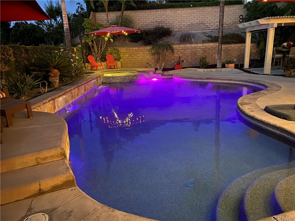 1879 Apostle Lane Riverside, CA 92506 - Photo 42 of 49 a view of swimming pool with seating space