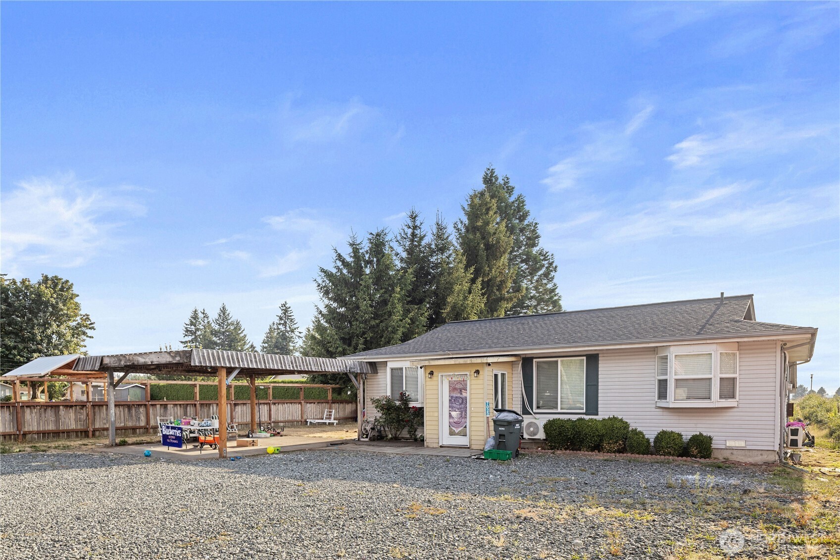 7025 Hannegan Road Lynden, WA 98264 - Photo 22 of 27 a front view of a house with garden