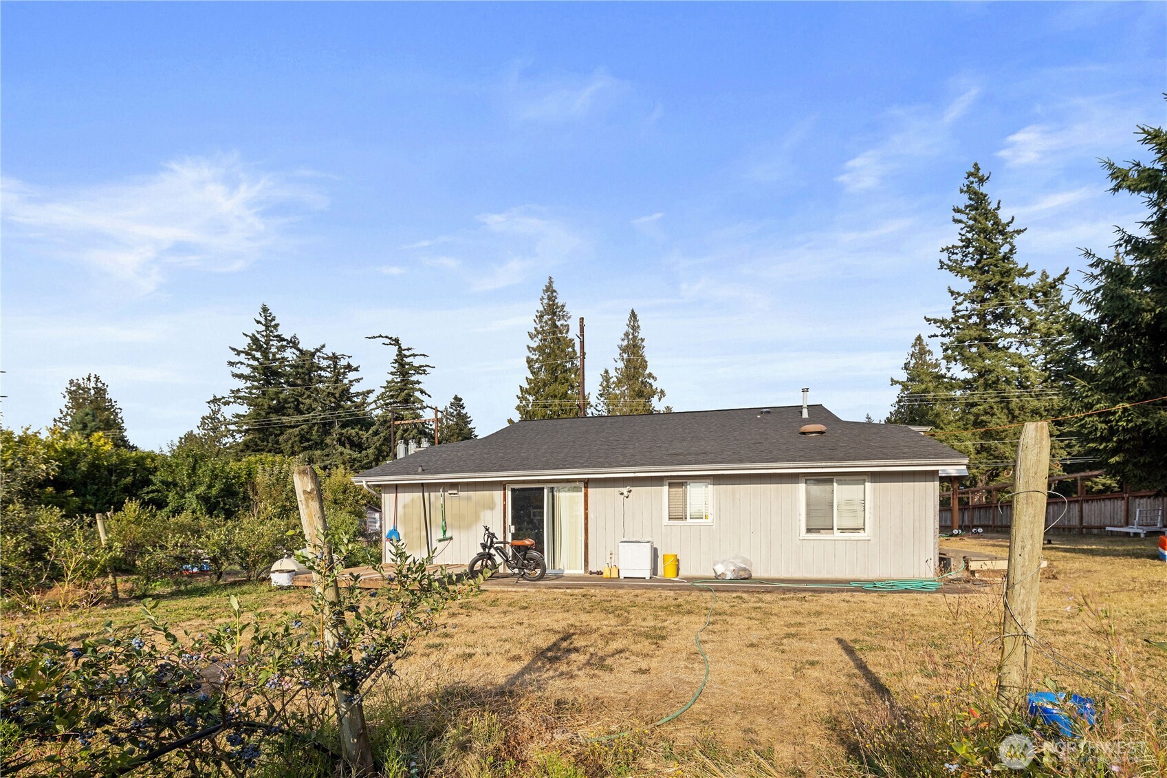 7025 Hannegan Road Lynden, WA 98264 - Photo 23 of 27 a front view of a house with a yard