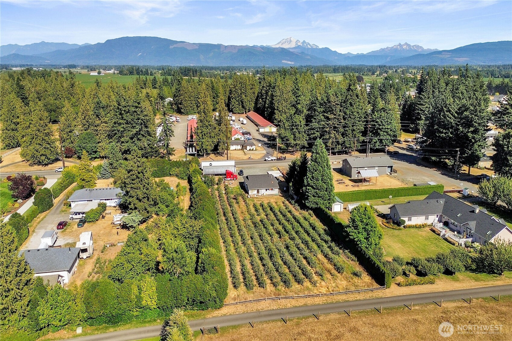 7025 Hannegan Road Lynden, WA 98264 - Photo 25 of 27 an aerial view of residential houses with outdoor space