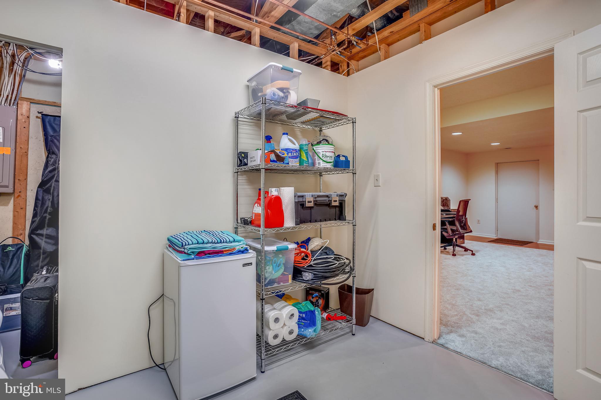 3759 Foxford Stream Road Baltimore, MD 21236 - Photo 32 of 37 Laundry, additional storage room to left