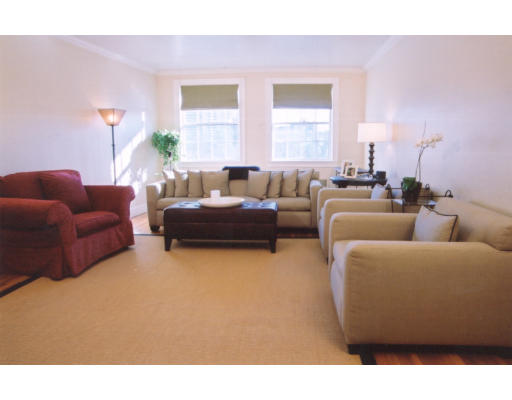 37 Beacon Street, Unit 41 37 Boston, MA 02108 - Photo 1 of 1 a living room with furniture and a large window