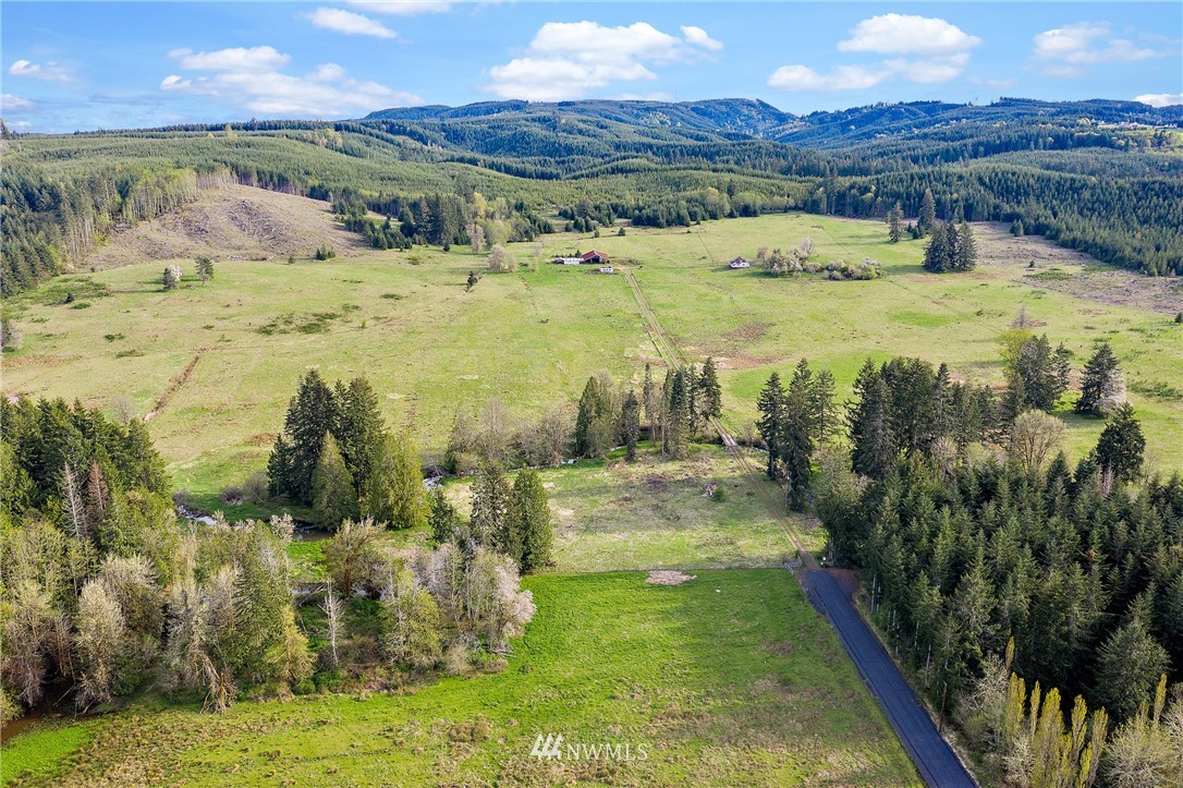 0 Ploegman Road Chehalis, WA 98532 - Photo 11 of 25 a view of a lake with a mountain