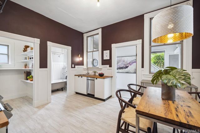 a view of a dining room kitchen and dining room