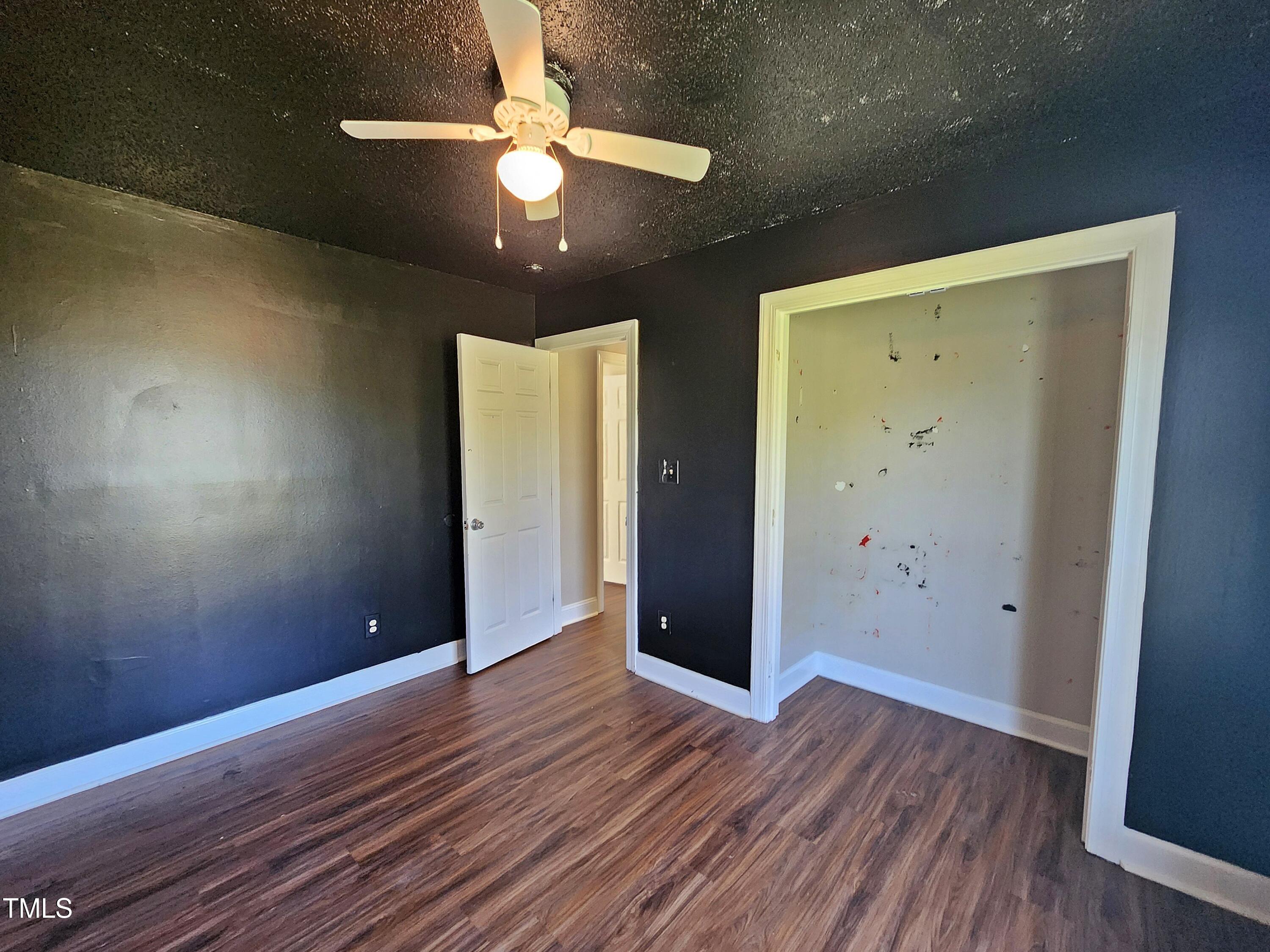 120 Keith Court Willow Spring, NC 27592 - Photo 20 of 25 wooden floor in an empty room with a window