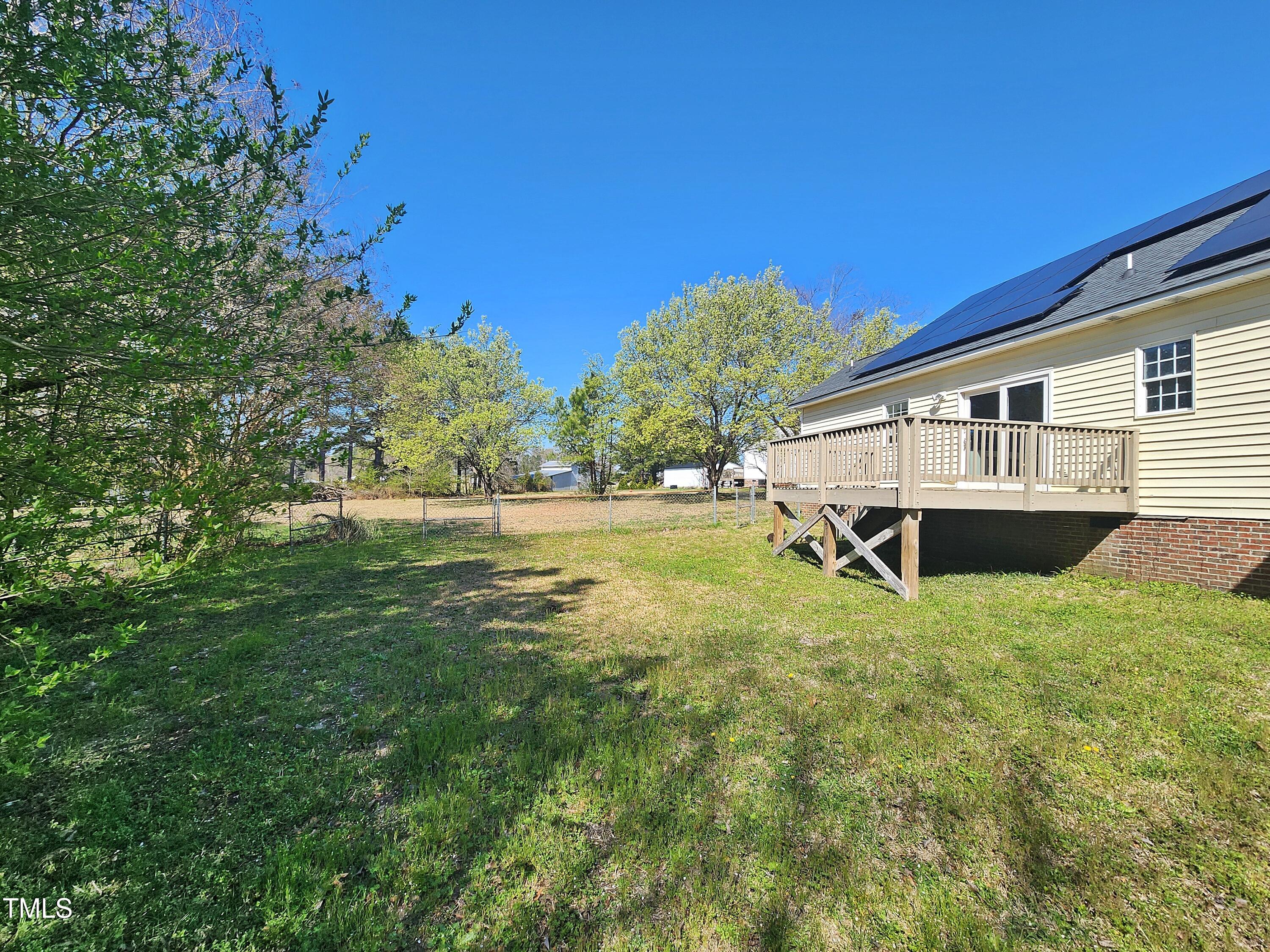 120 Keith Court Willow Spring, NC 27592 - Photo 6 of 25 a house with river in front of it
