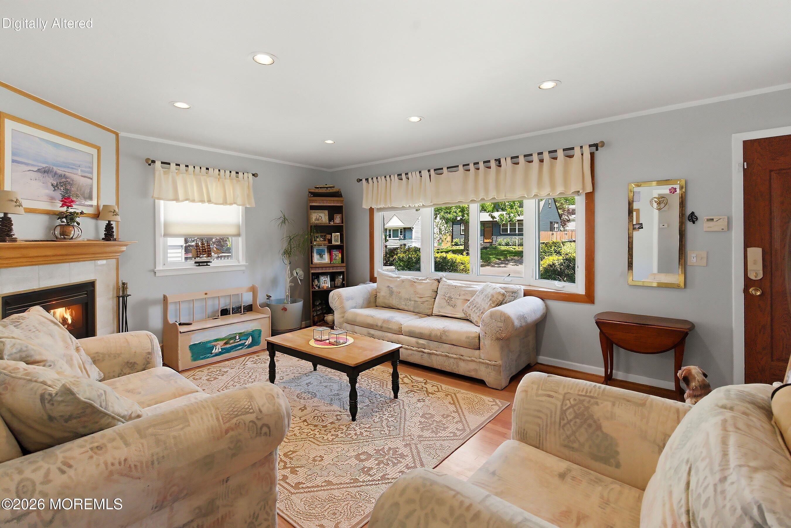 412 Moore Road Neptune Township, NJ 07753 - Photo 6 of 36 a living room with furniture and a large window