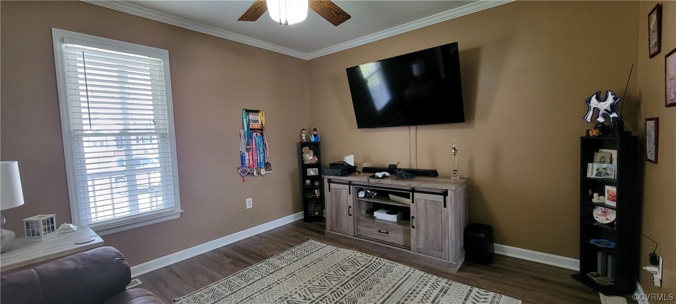 4924 Old Logging Circle Prince George, VA 23875 - Photo 16 of 22 a living room with furniture and a flat screen tv
