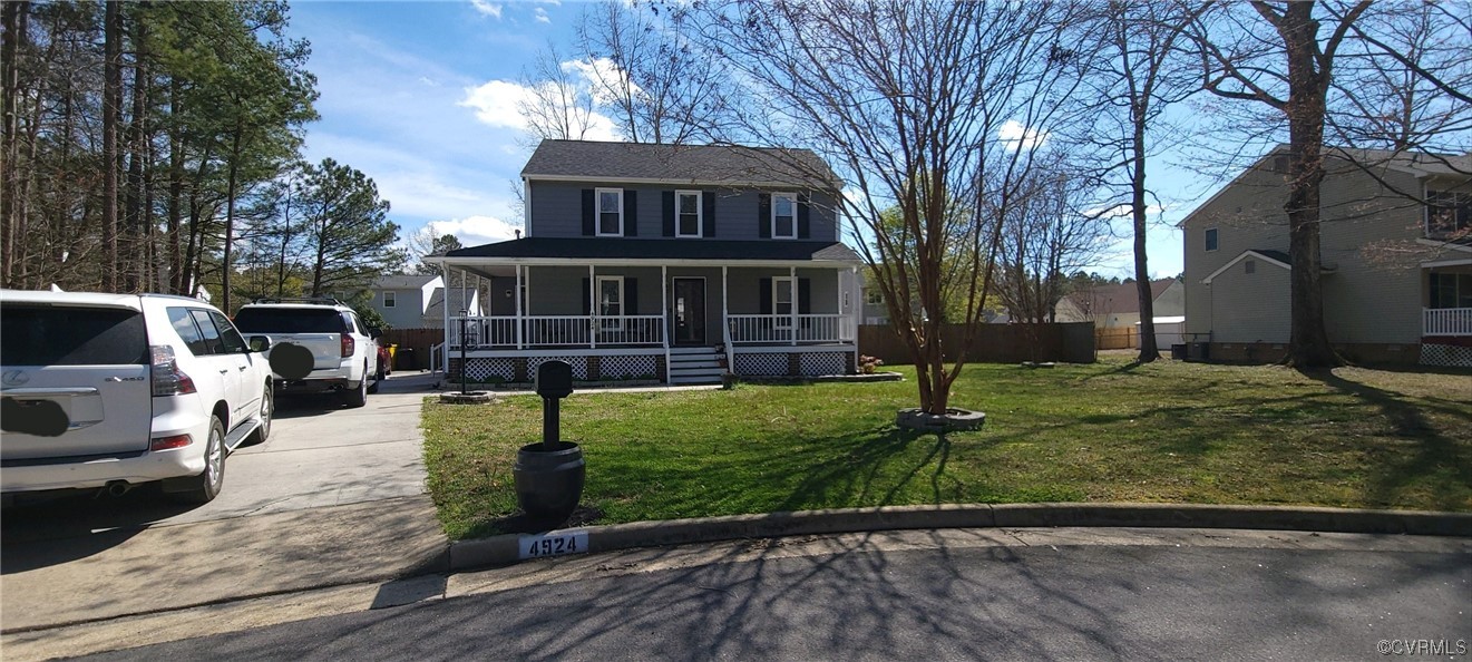 4924 Old Logging Circle Prince George, VA 23875 - Photo 2 of 22 a front view of a house with garden
