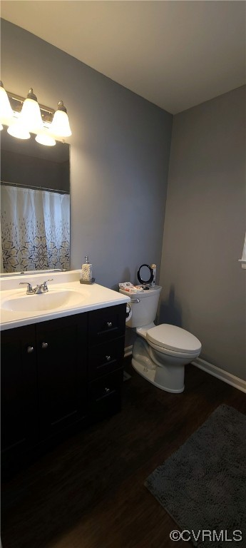 4924 Old Logging Circle Prince George, VA 23875 - Photo 22 of 22 a bathroom with a toilet a sink and a mirror