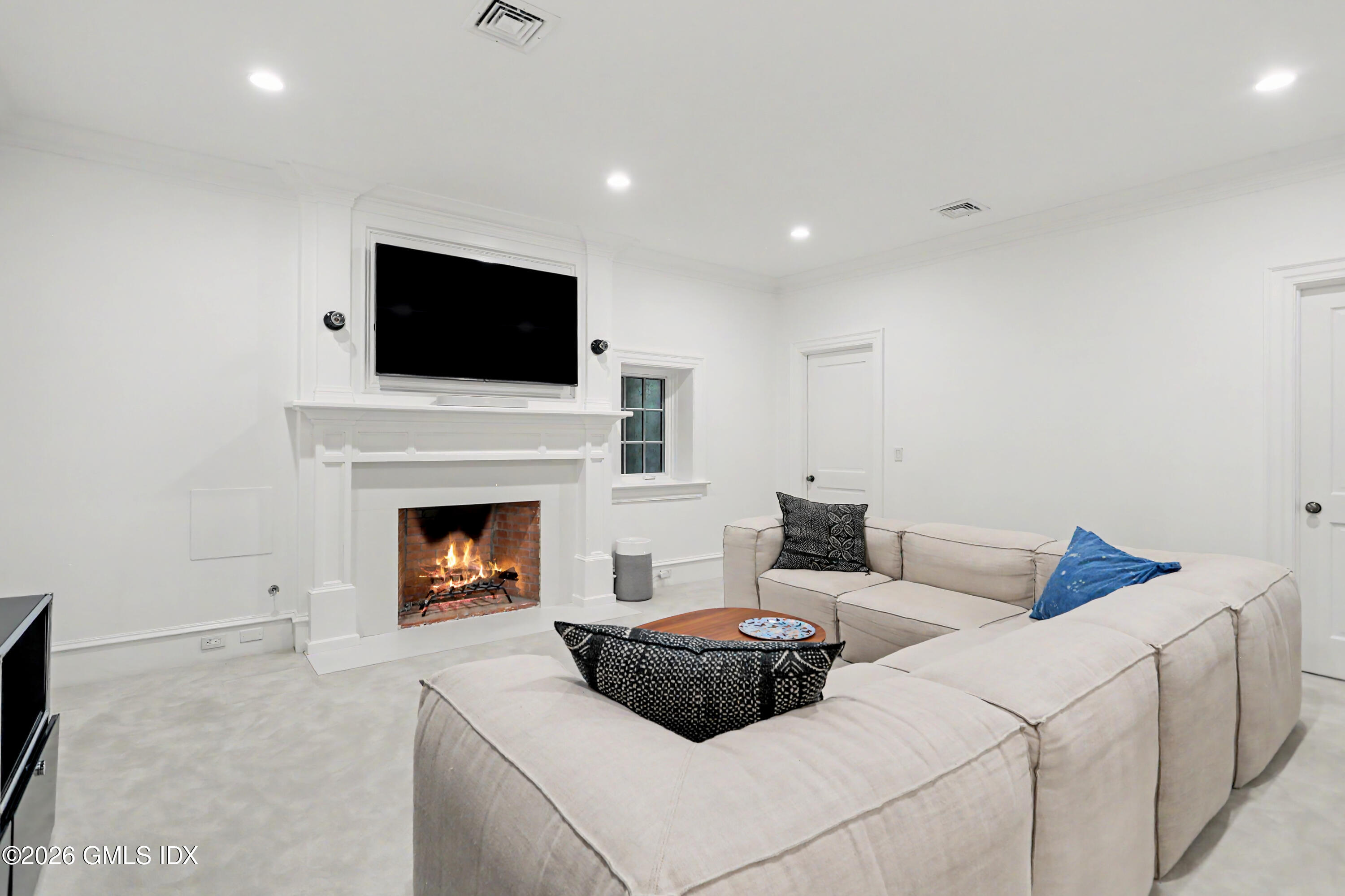 50 Sound View Drive, Unit 2 SOUTH Greenwich, CT 06830 - Photo 12 of 23 Lower Level Family Room