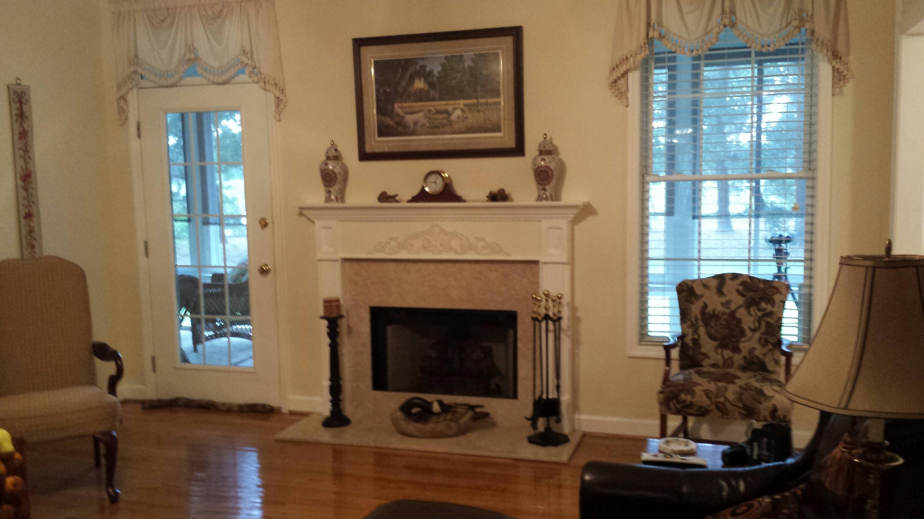 4425 Lord Proprietors Road Meggett, SC 29449 - Photo 8 of 22 Fireplace in family room