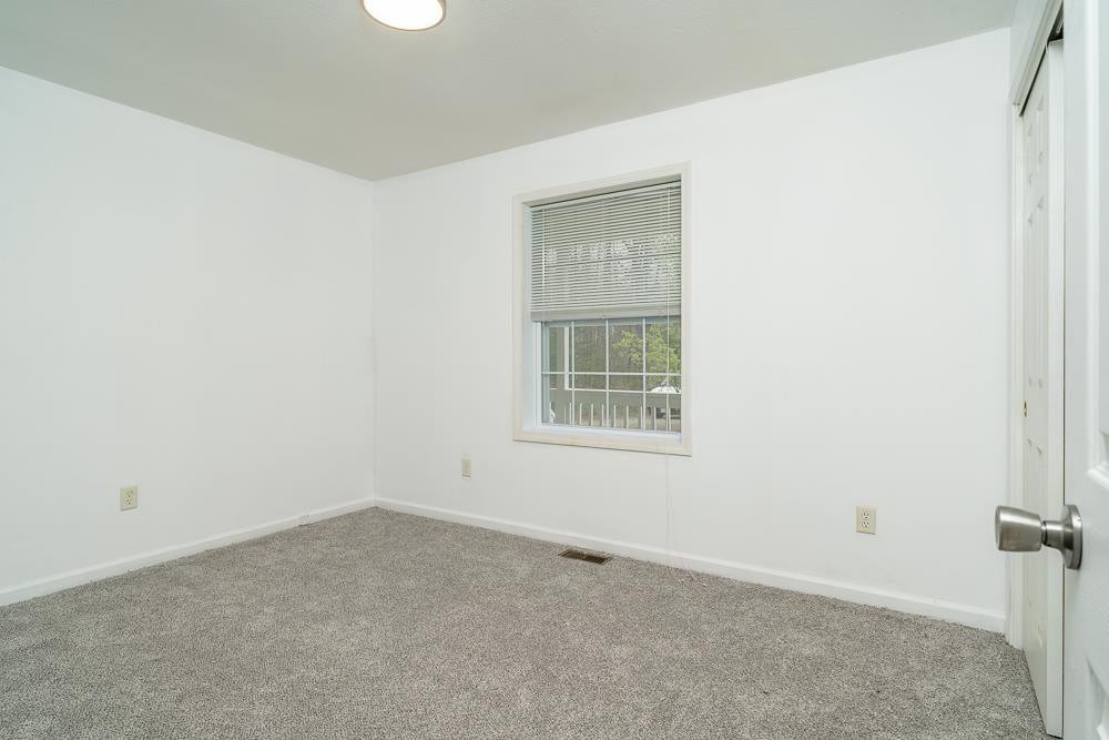 4350 Sharon Road Esmont, VA 22937 - Photo 13 of 40 an empty room with a window