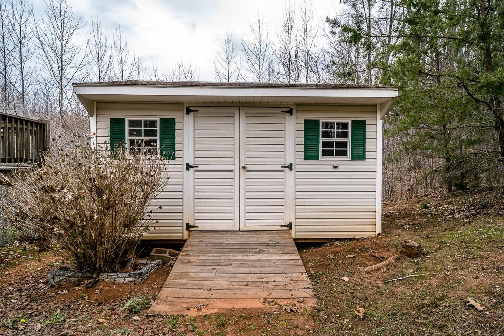 4350 Sharon Road Esmont, VA 22937 - Photo 29 of 40 a view of a house with a yard
