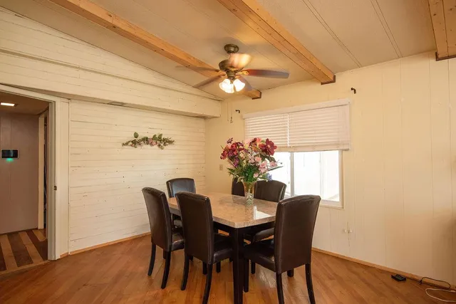 a kitchen with a sink stove and refrigerator