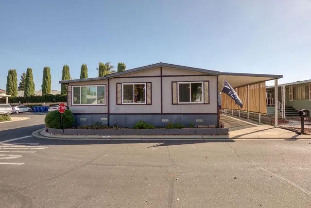 a front view of a house with a porch