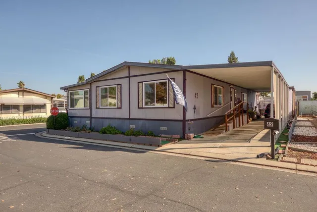 a view of a house with a street