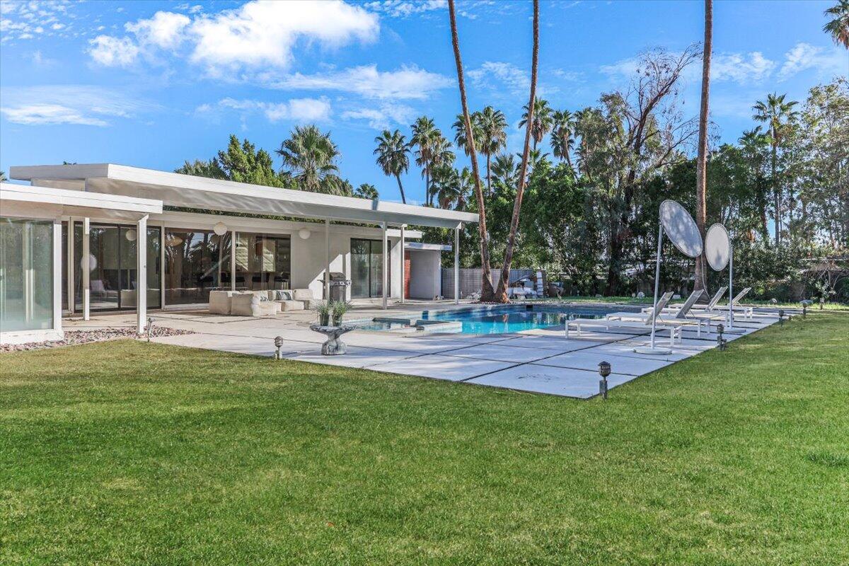 447 West Mariscal Road Palm Springs, CA 92262 - Photo 16 of 22 a front view of house with yard