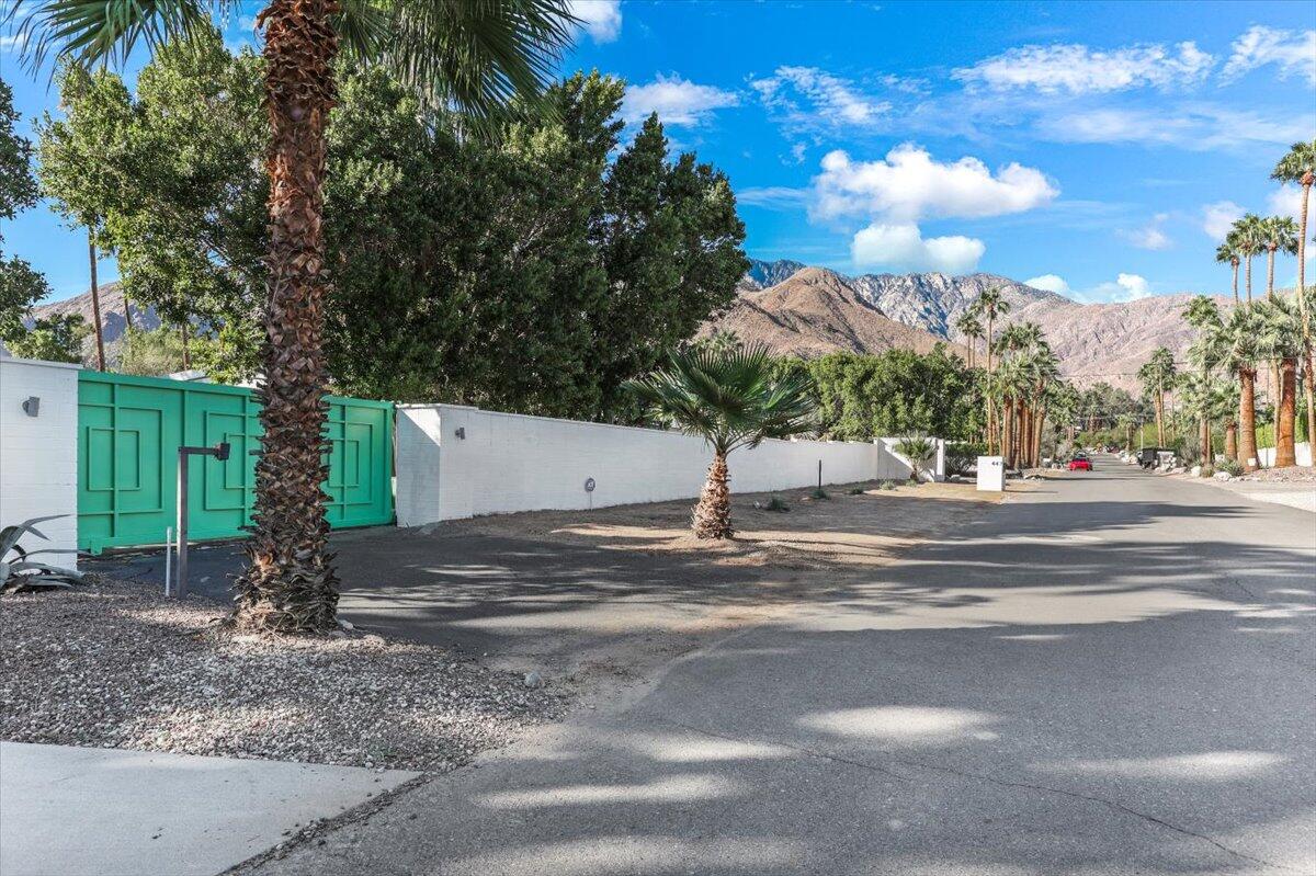 447 West Mariscal Road Palm Springs, CA 92262 - Photo 6 of 22 a view of a house with a yard and tree s
