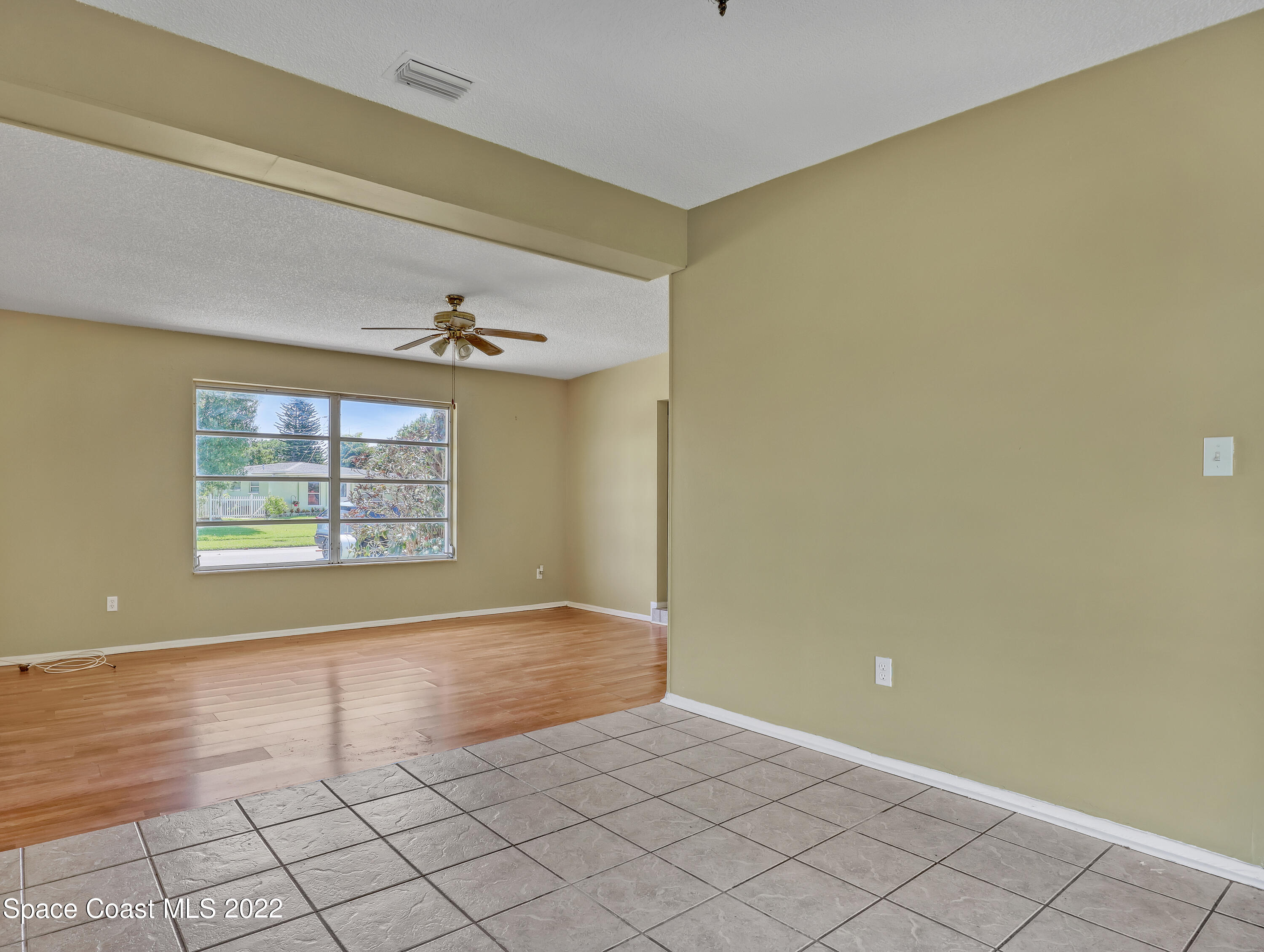2808 Starlight Circle Northeast Palm Bay, FL 32905 - Photo 11 of 33 a view of an empty room with a window