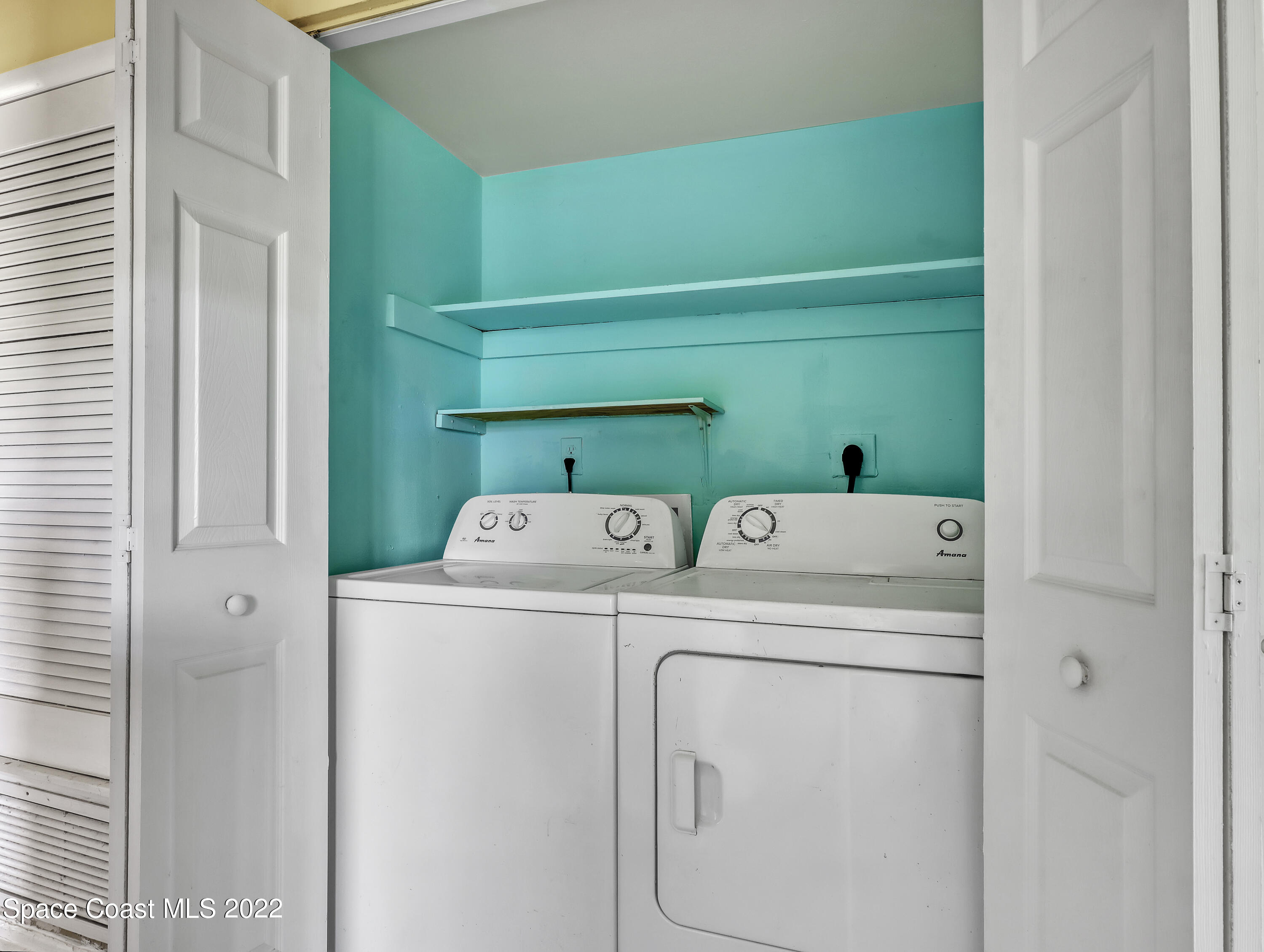 2808 Starlight Circle Northeast Palm Bay, FL 32905 - Photo 15 of 33 a utility room with dryer and washer