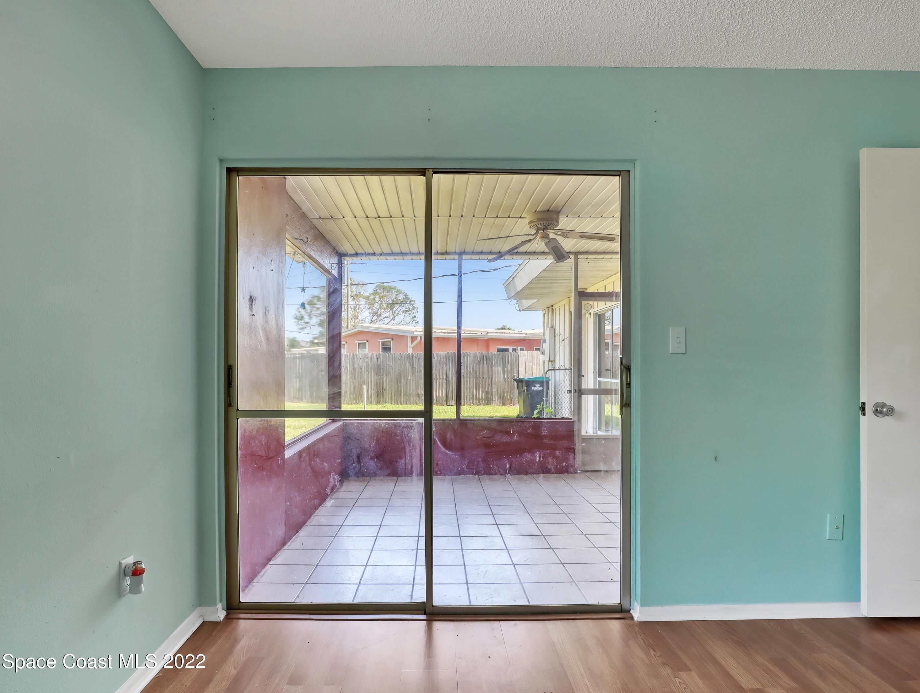 2808 Starlight Circle Northeast Palm Bay, FL 32905 - Photo 17 of 33 a view of a room with wooden floor