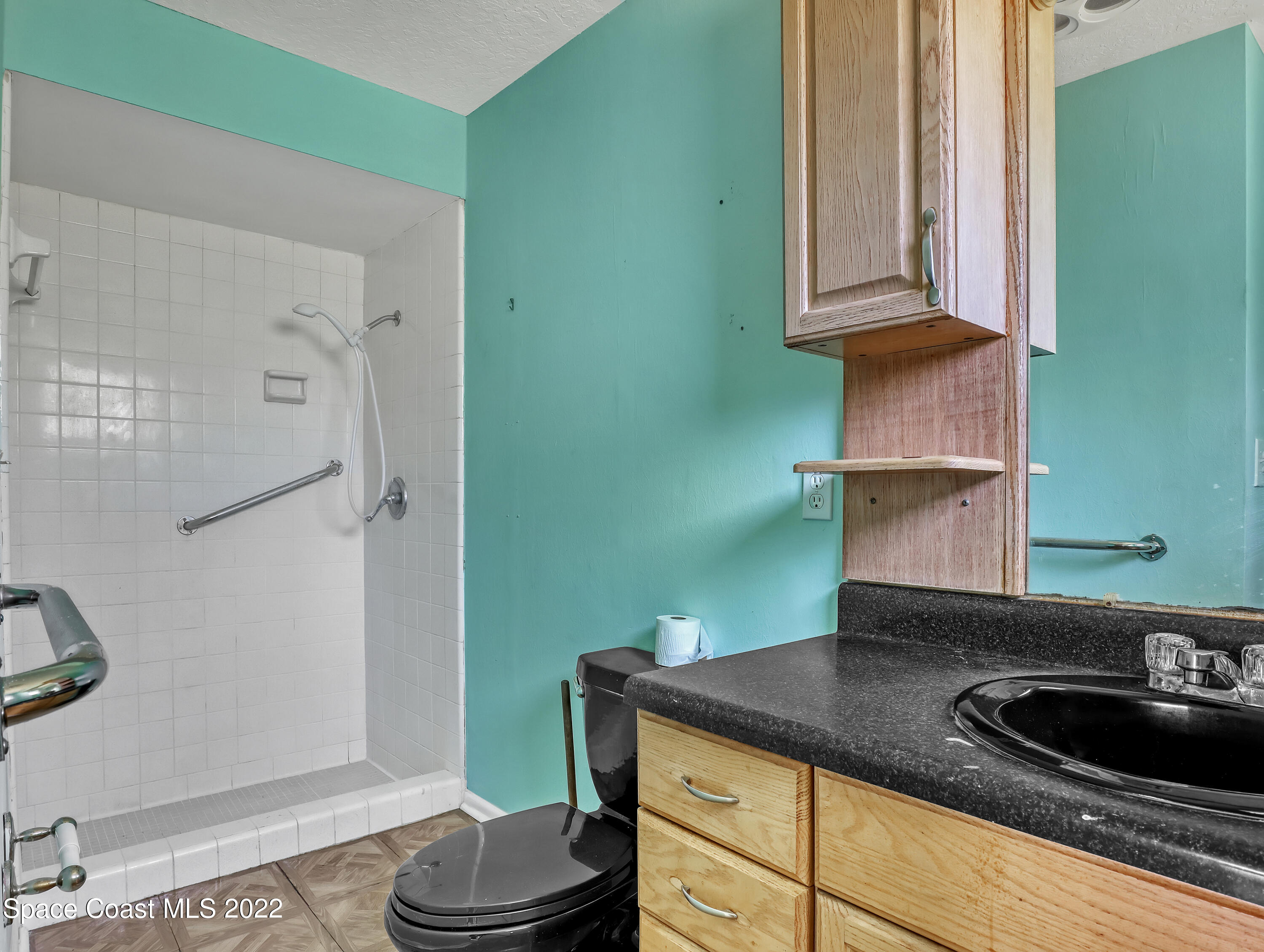 2808 Starlight Circle Northeast Palm Bay, FL 32905 - Photo 20 of 33 a kitchen with sink and window