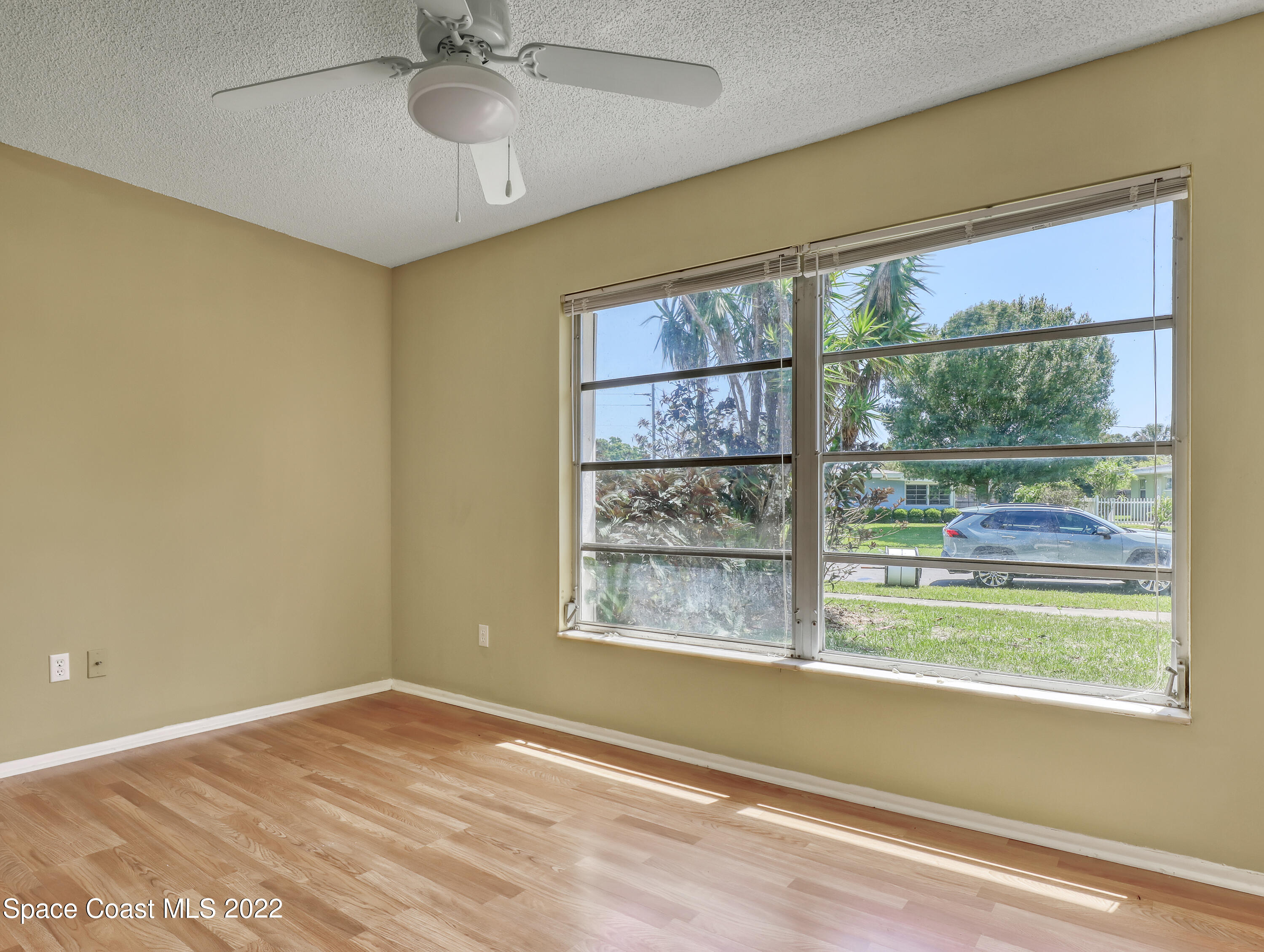 2808 Starlight Circle Northeast Palm Bay, FL 32905 - Photo 22 of 33 a view of an empty room with a window
