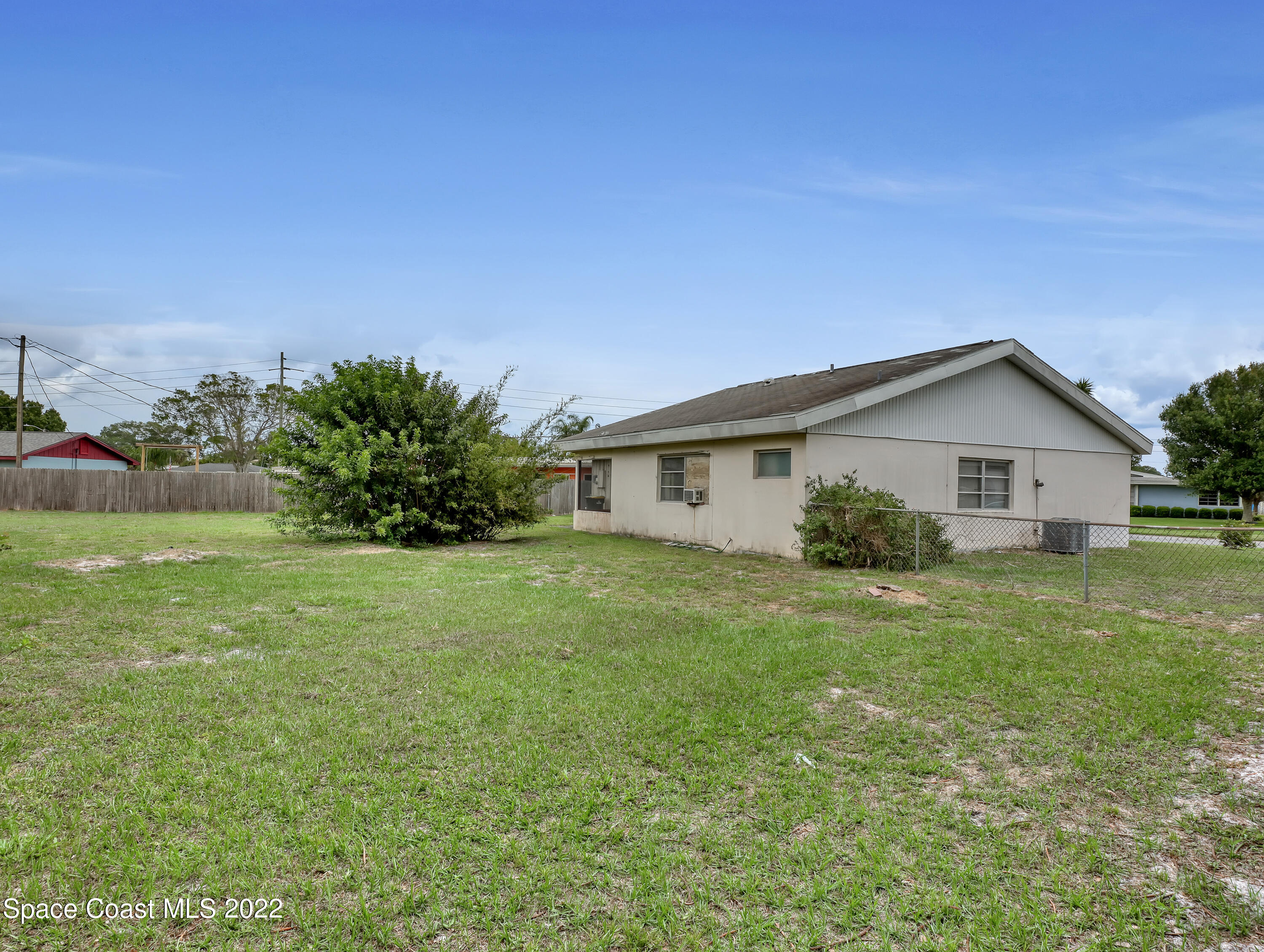 2808 Starlight Circle Northeast Palm Bay, FL 32905 - Photo 33 of 33 a front view of house with yard and green space