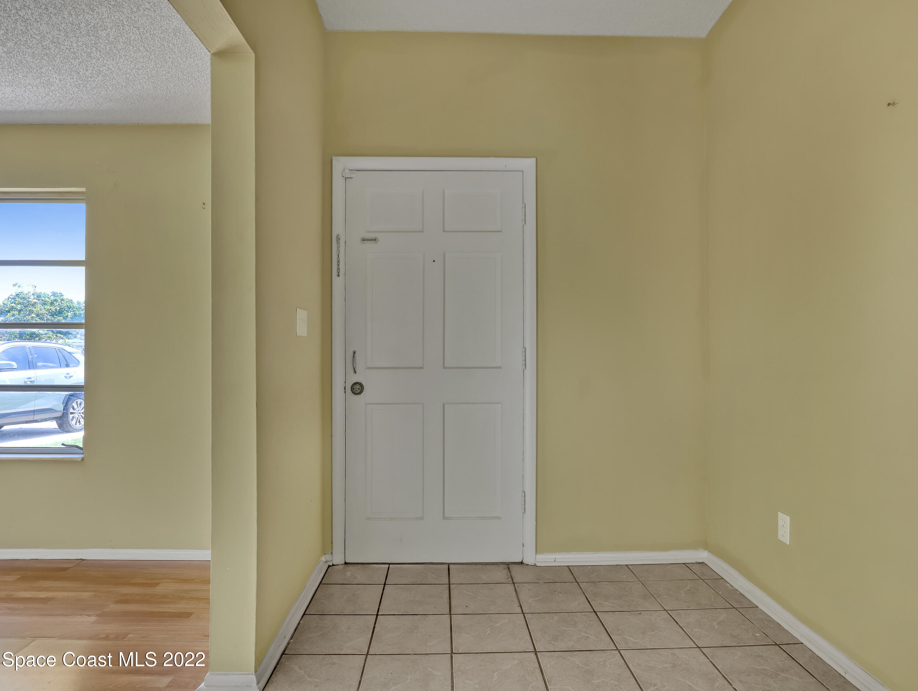 2808 Starlight Circle Northeast Palm Bay, FL 32905 - Photo 6 of 33 a view of an empty room and window