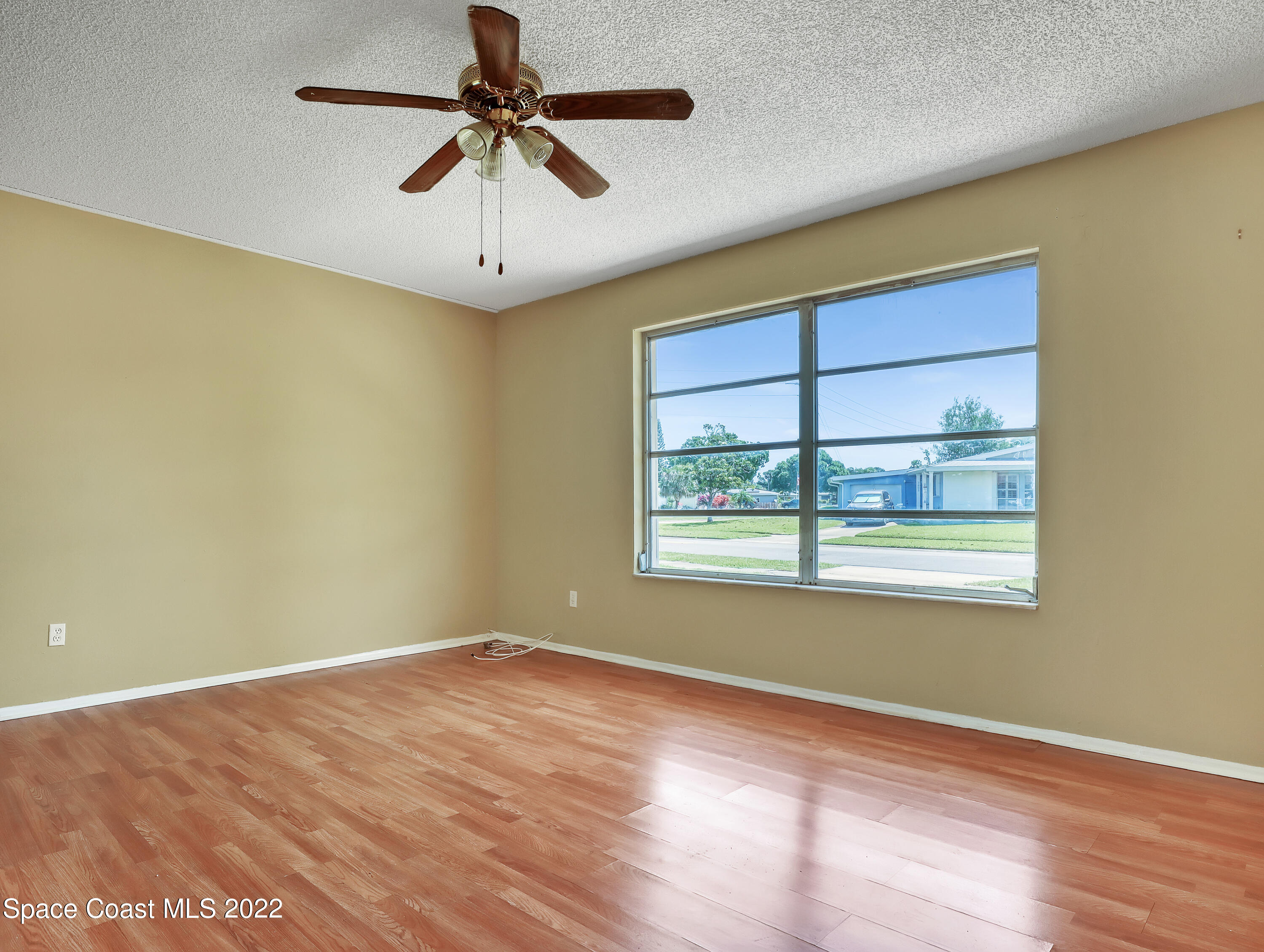 2808 Starlight Circle Northeast Palm Bay, FL 32905 - Photo 8 of 33 a view of an empty room with a window