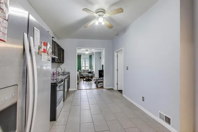 a view of a livingroom with a flat screen tv