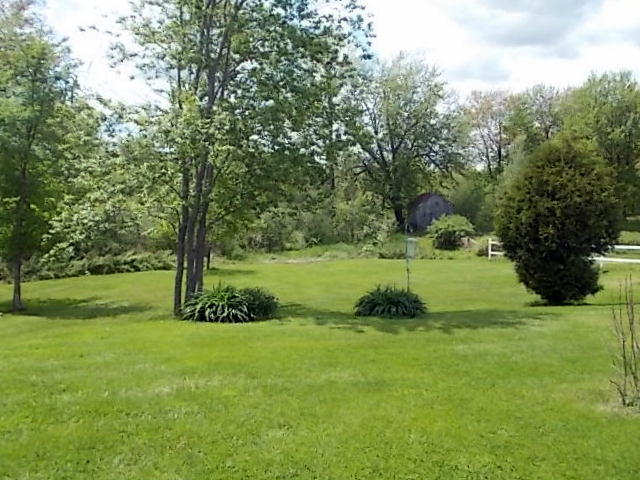 73 Field Road Sidney, ME 04330 - Photo 21 of 32 BACKYARD