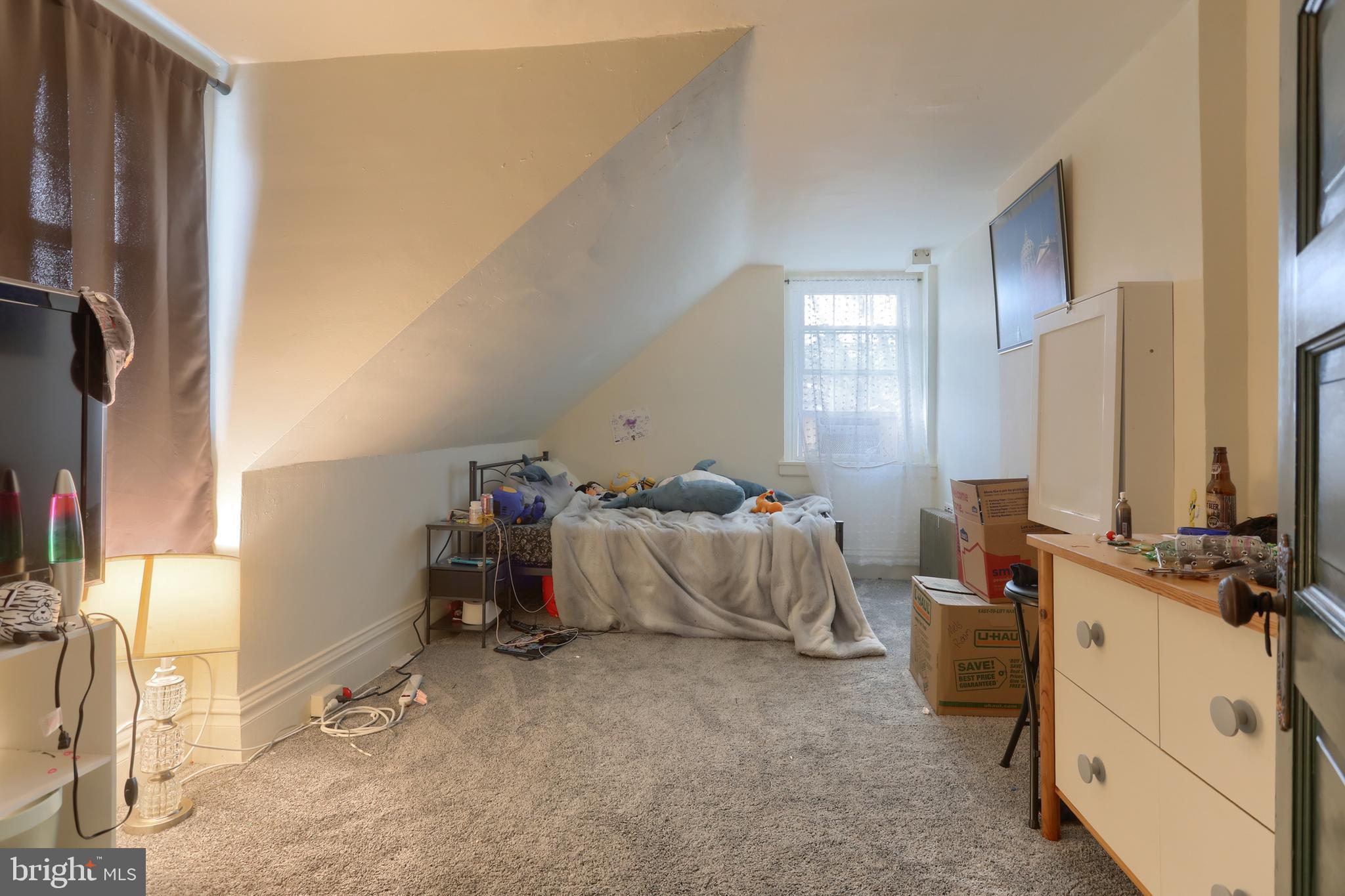 229 Cocoa Avenue Hershey, PA 17033 - Photo 21 of 28 a bed room with a bed and a window